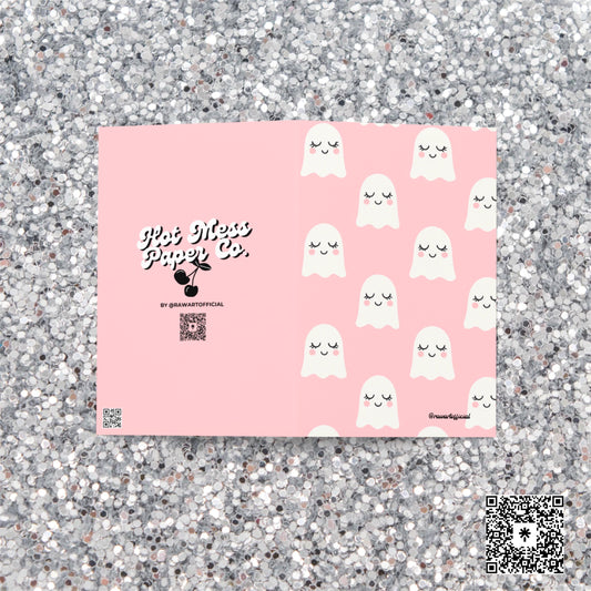 Pink greeting card with repeating white smiling ghosts featuring rosy cheeks and sleepy eyes in kawaii pastel style.