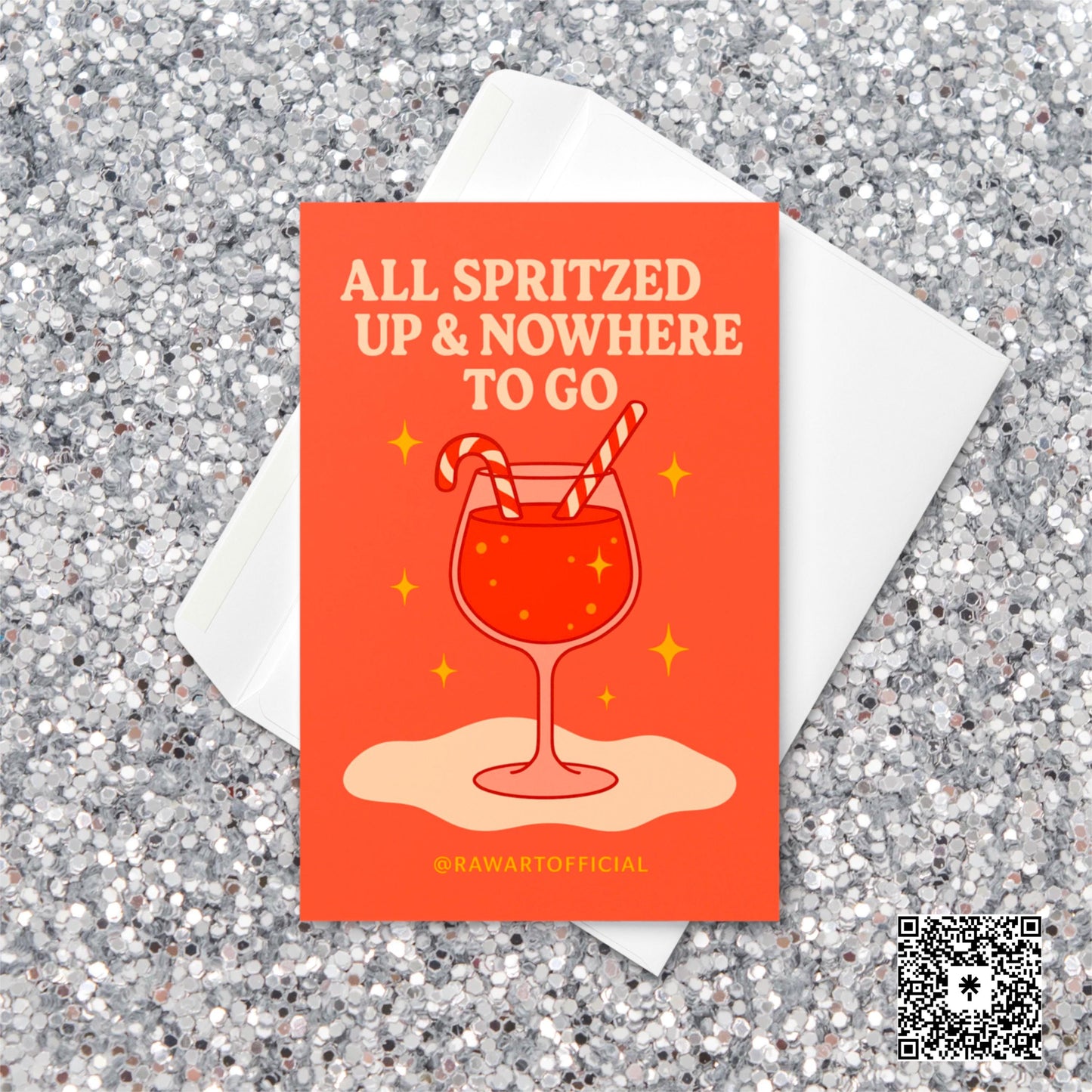 Retro orange Christmas card featuring a glass of spritz with two candy cane straws and sparkly golden stars, with the phrase “All Spritzed Up & Nowhere to Go” in cream-colored text.