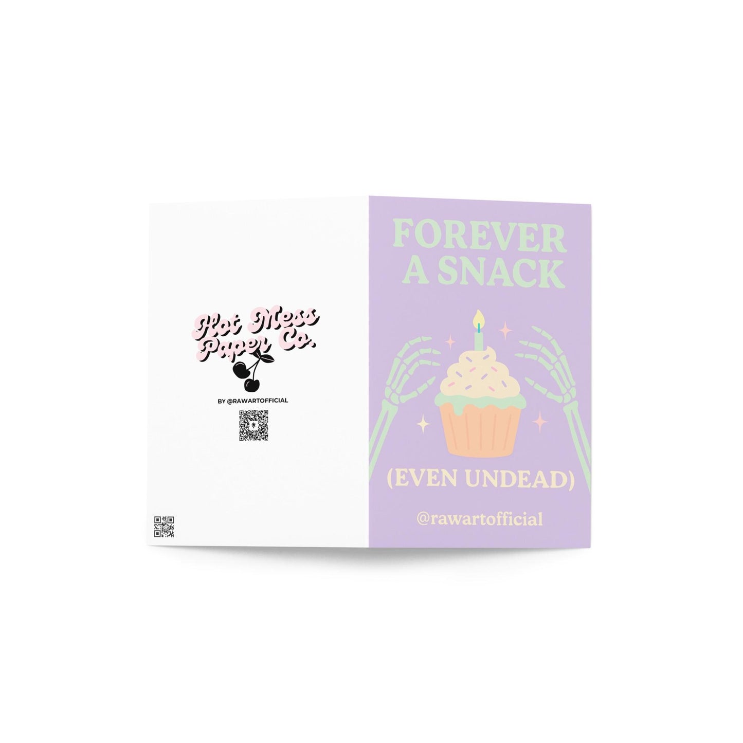 Halloween card with skeleton hands holding cupcake and text “Forever a Snack (Even Undead)” in pastel purple and green.