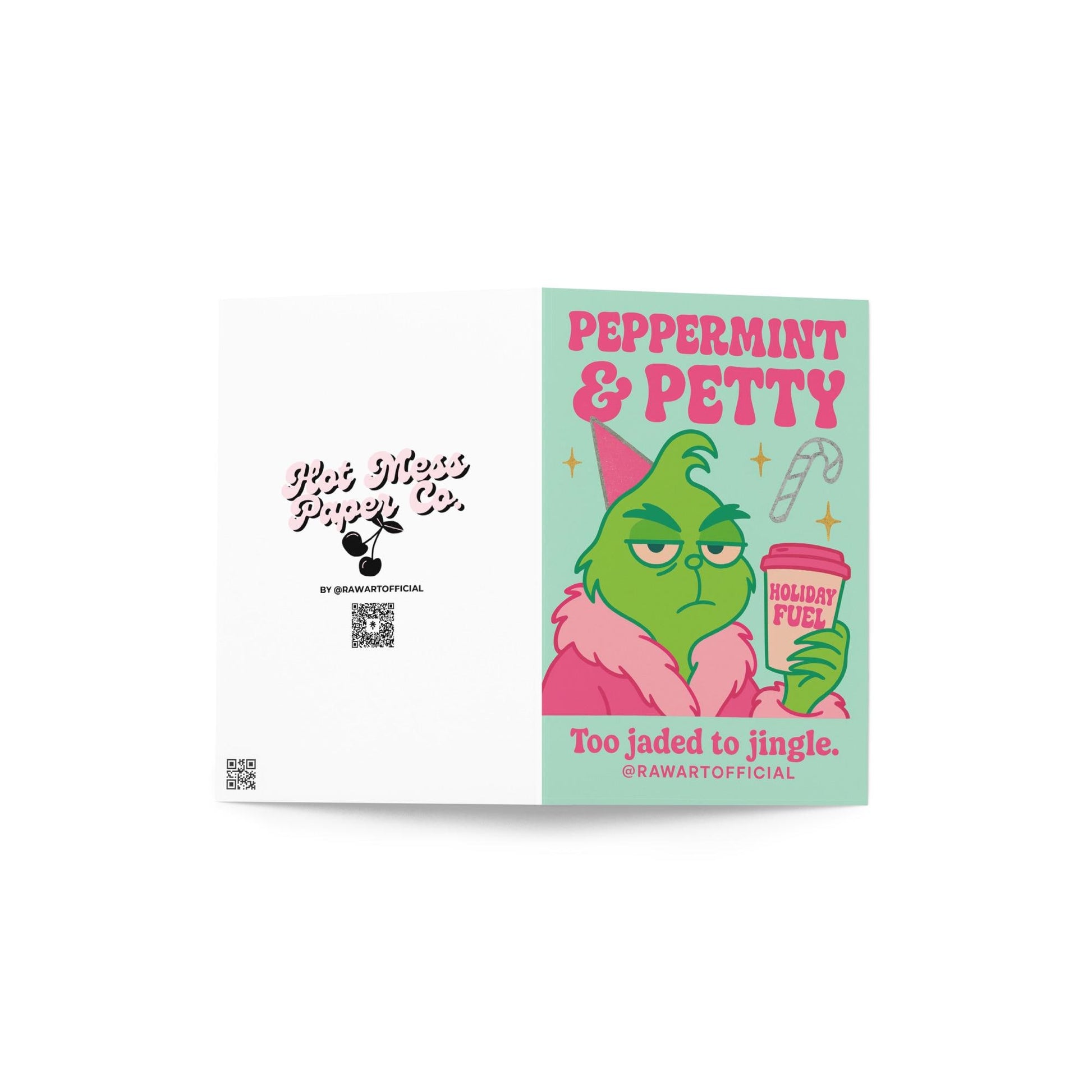 Mint green and pink Christmas card with a grumpy green character in a pink robe holding a cup labeled “Holiday Fuel,” text reads “Peppermint & Petty — Too jaded to jingle.”
