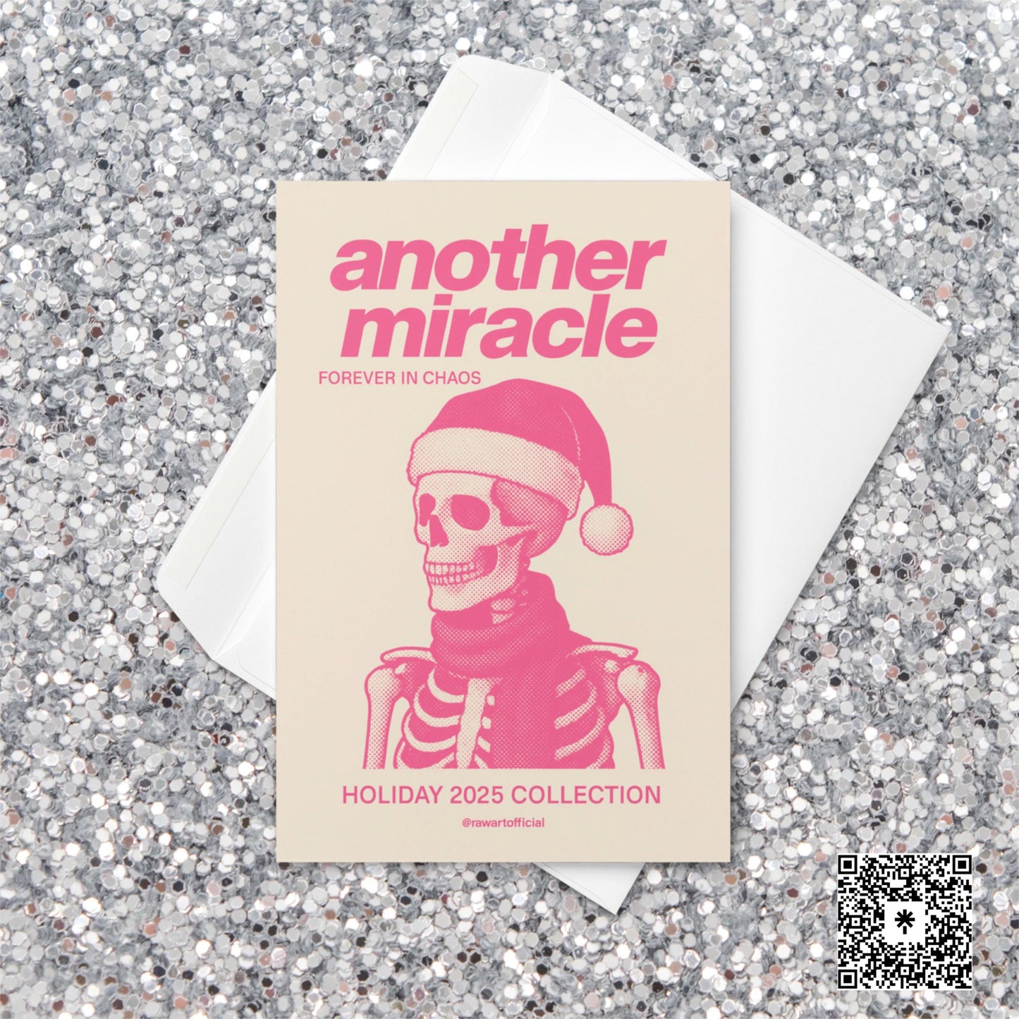 Pink and cream Christmas card featuring a skeleton wearing a Santa hat and scarf with text reading “Another Miracle — Forever in Chaos. Holiday 2025 Collection.”