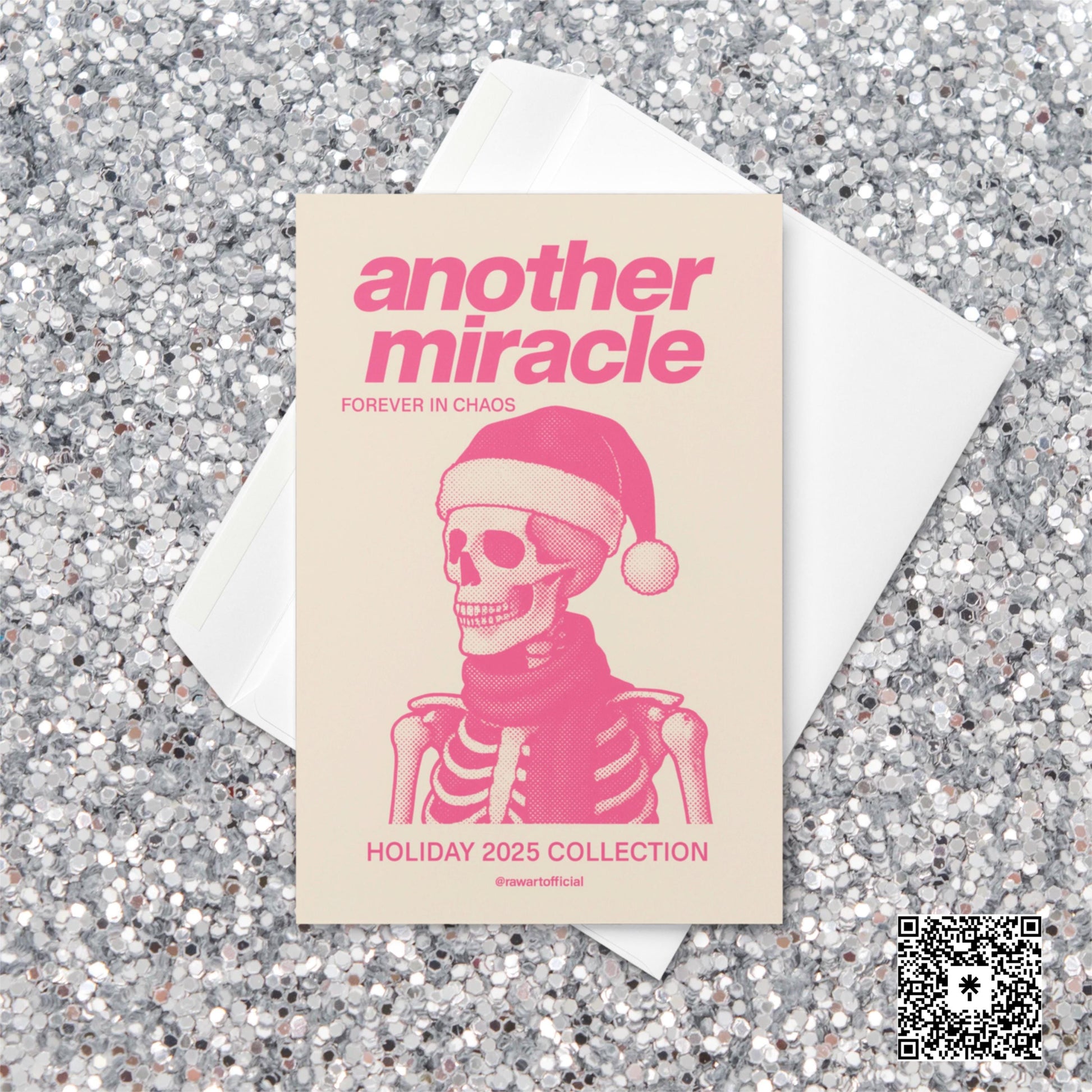 Pink and cream Christmas card featuring a skeleton wearing a Santa hat and scarf with text reading “Another Miracle — Forever in Chaos. Holiday 2025 Collection.”