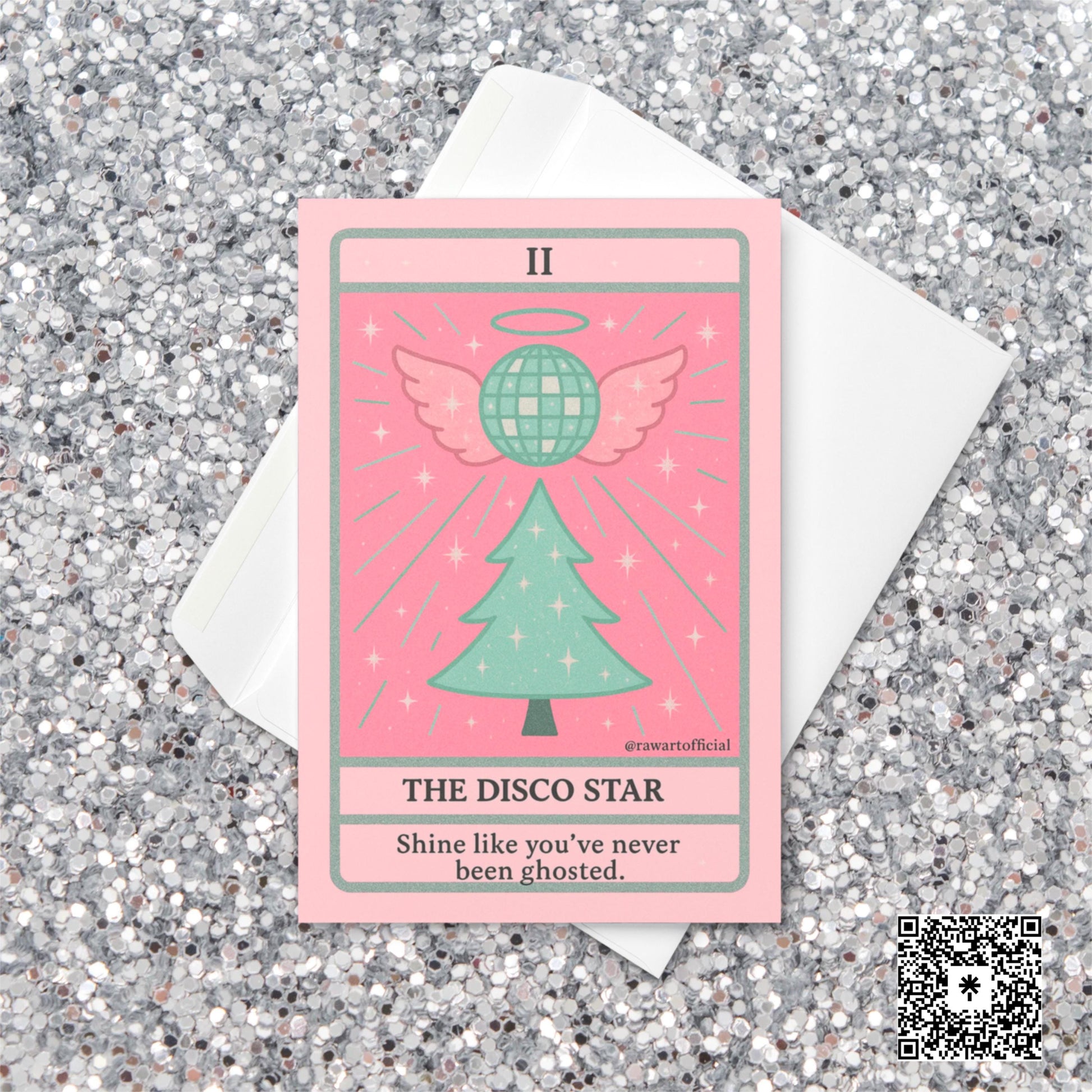 Pastel pink and mint Christmas tarot-style card featuring a sparkly disco ball with angel wings above a Christmas tree, with text reading “The Disco Star – Shine like you’ve never been ghosted.”