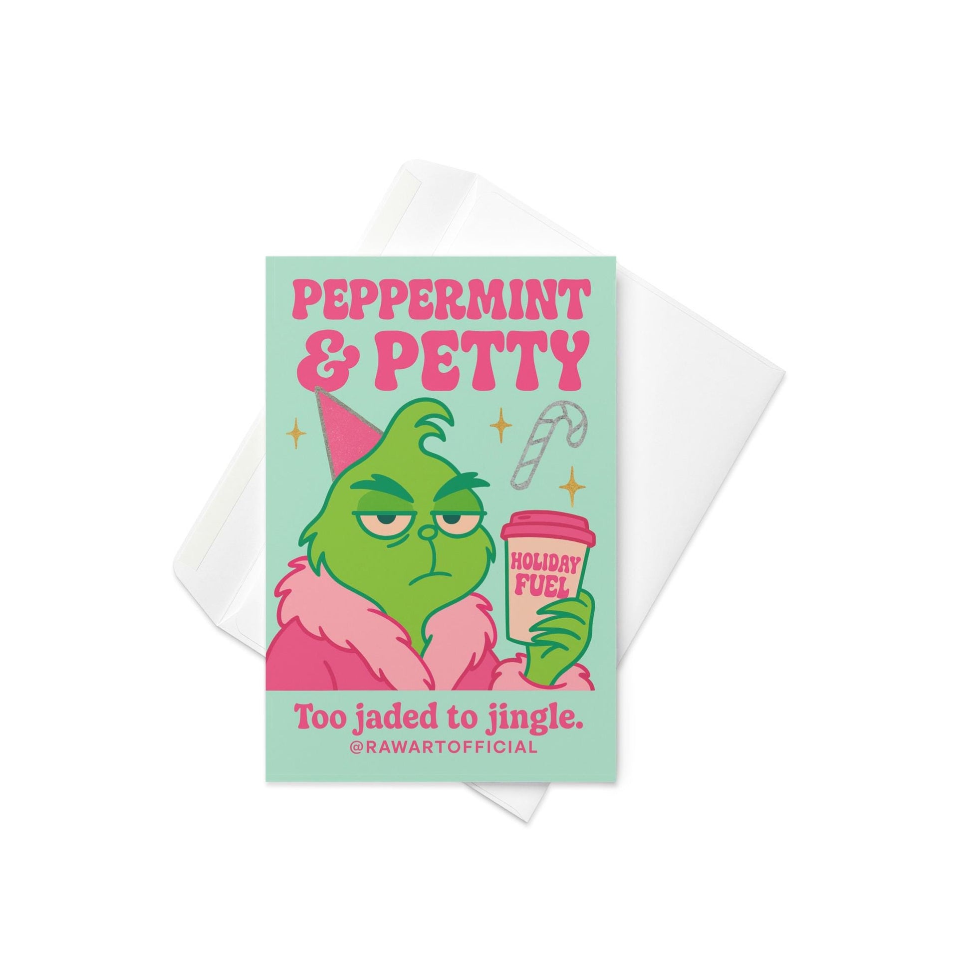 Mint green and pink Christmas card with a grumpy green character in a pink robe holding a cup labeled “Holiday Fuel,” text reads “Peppermint & Petty — Too jaded to jingle.”