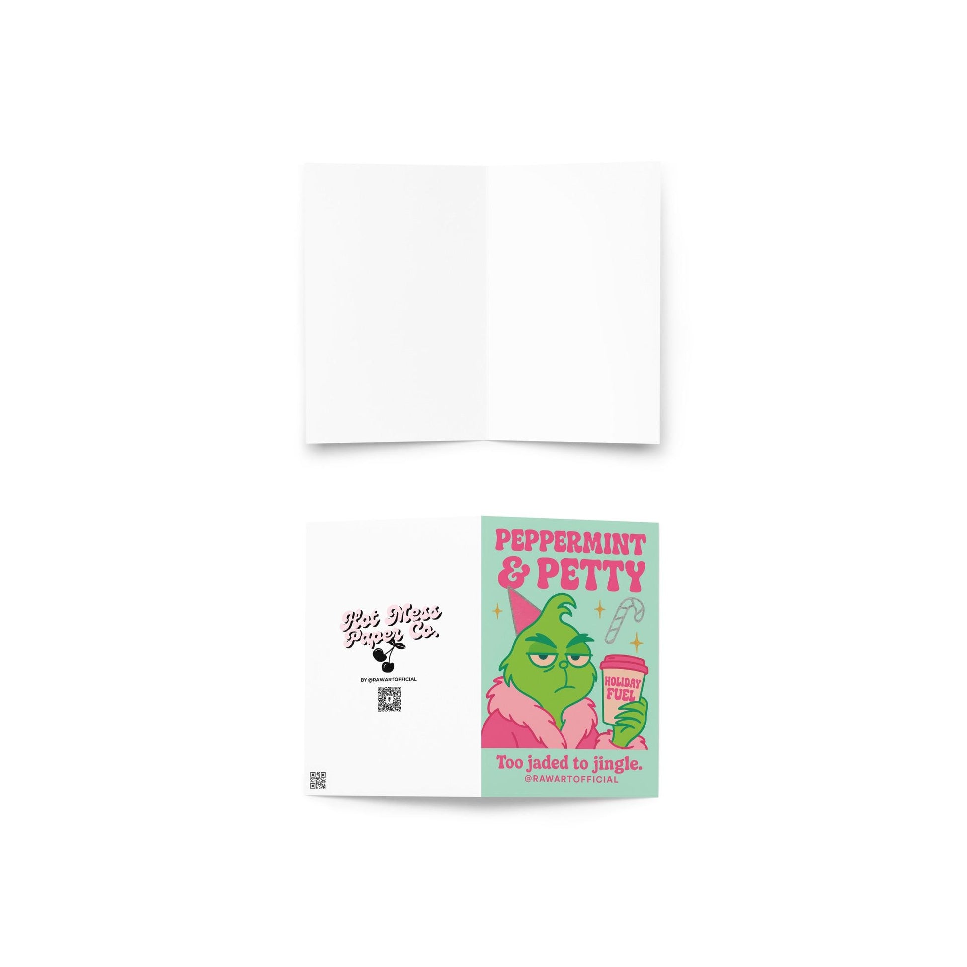 Mint green and pink Christmas card with a grumpy green character in a pink robe holding a cup labeled “Holiday Fuel,” text reads “Peppermint & Petty — Too jaded to jingle.”