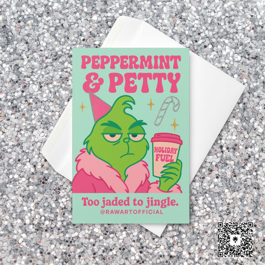 Mint green and pink Christmas card with a grumpy green character in a pink robe holding a cup labeled “Holiday Fuel,” text reads “Peppermint & Petty — Too jaded to jingle.”