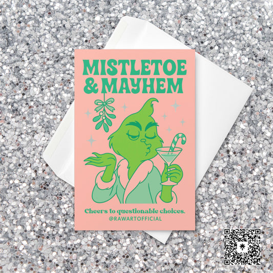 Pastel pink and mint Christmas card showing a green diva holding a candy cane martini under mistletoe with the text “Mistletoe & Mayhem – Cheers to questionable choices.”