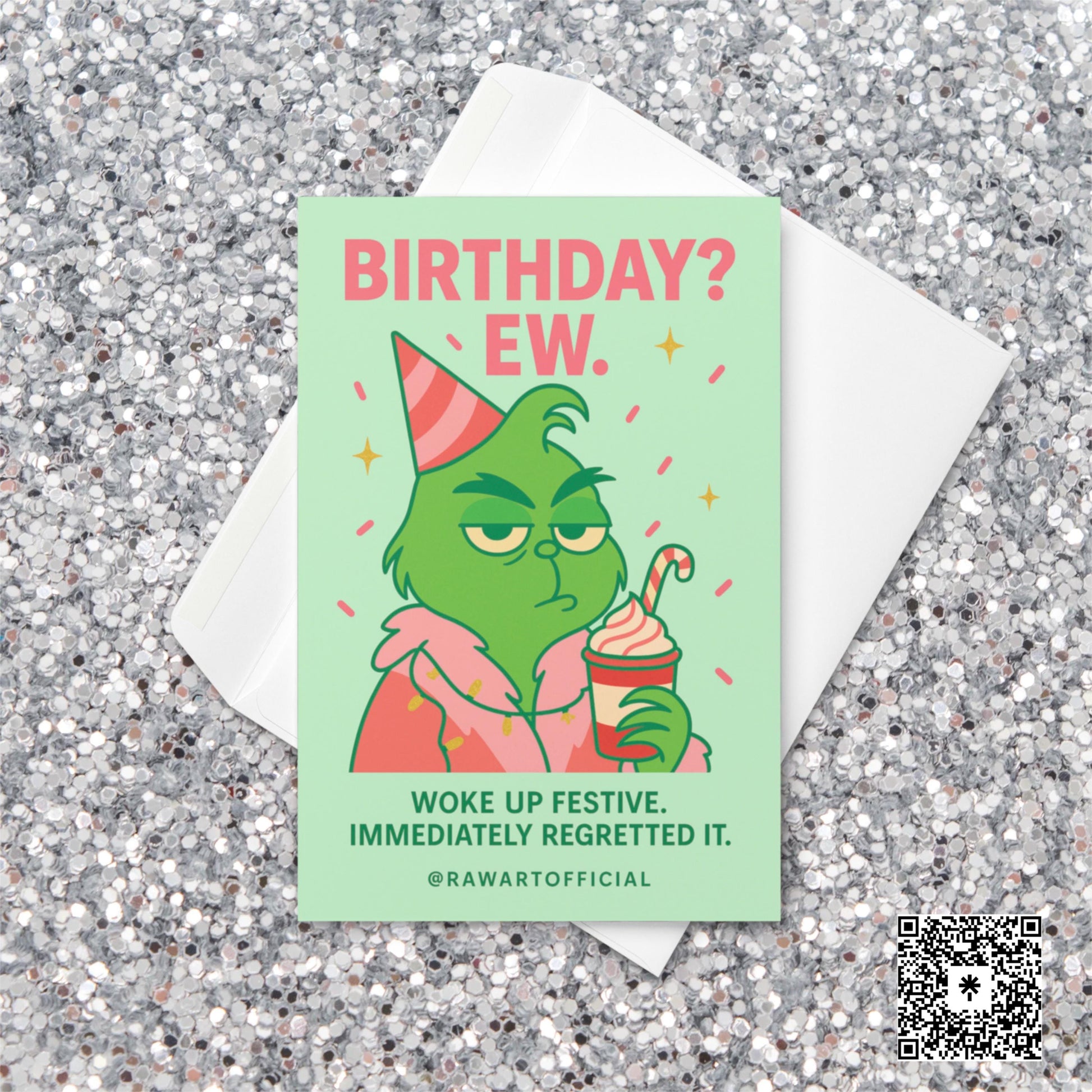 Pastel mint and pink Christmas birthday card featuring a green character in a party hat holding a candy cane latte with the text “Birthday? Ew. Woke up festive. Immediately regretted it.”