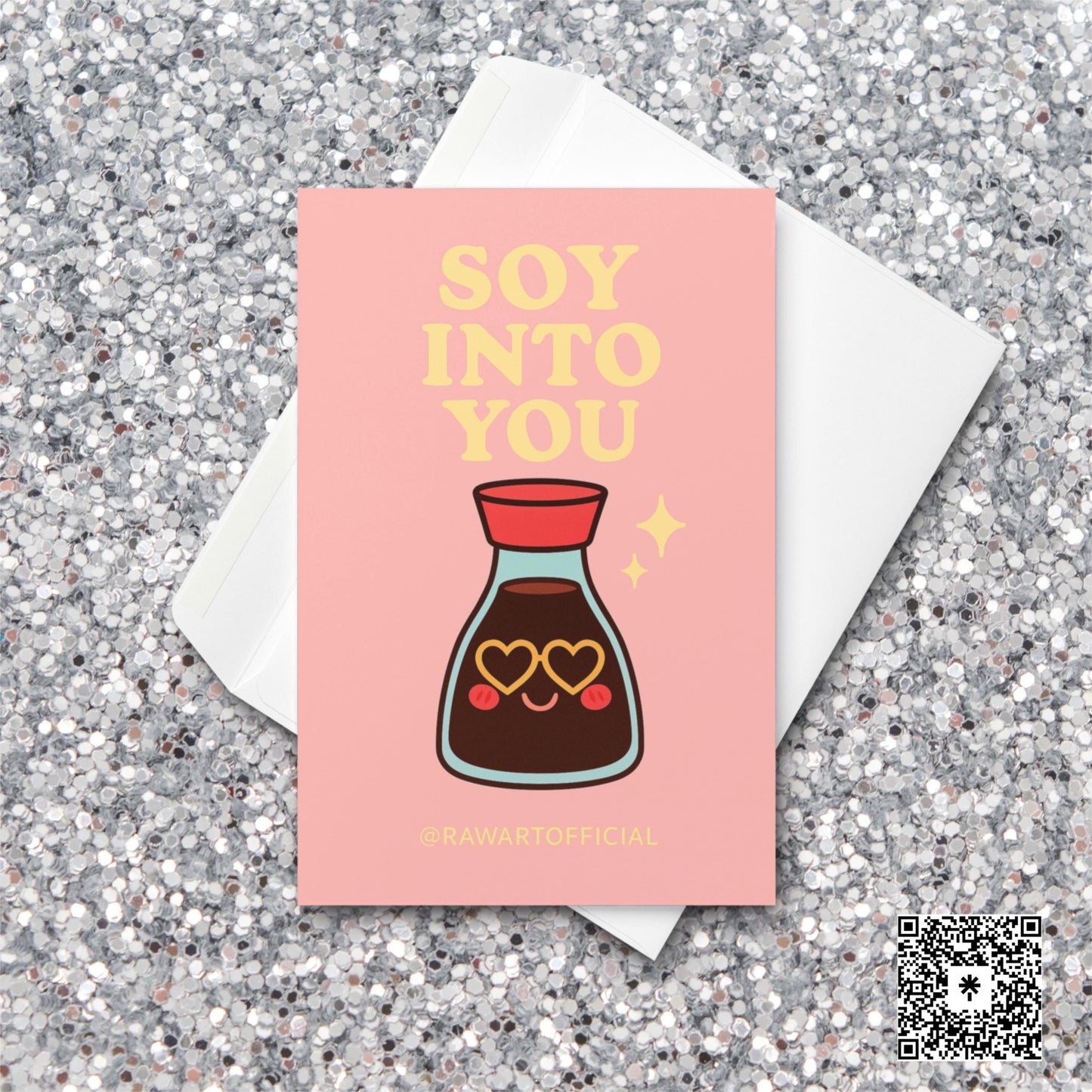 Cute soy sauce bottle with heart-shaped sunglasses under text reading “Soy Into You” on pink background.