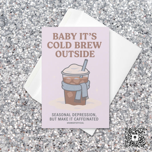 Pastel holiday card featuring an iced coffee in a scarf with text reading “Baby It’s Cold Brew Outside — Seasonal depression, but make it caffeinated.”