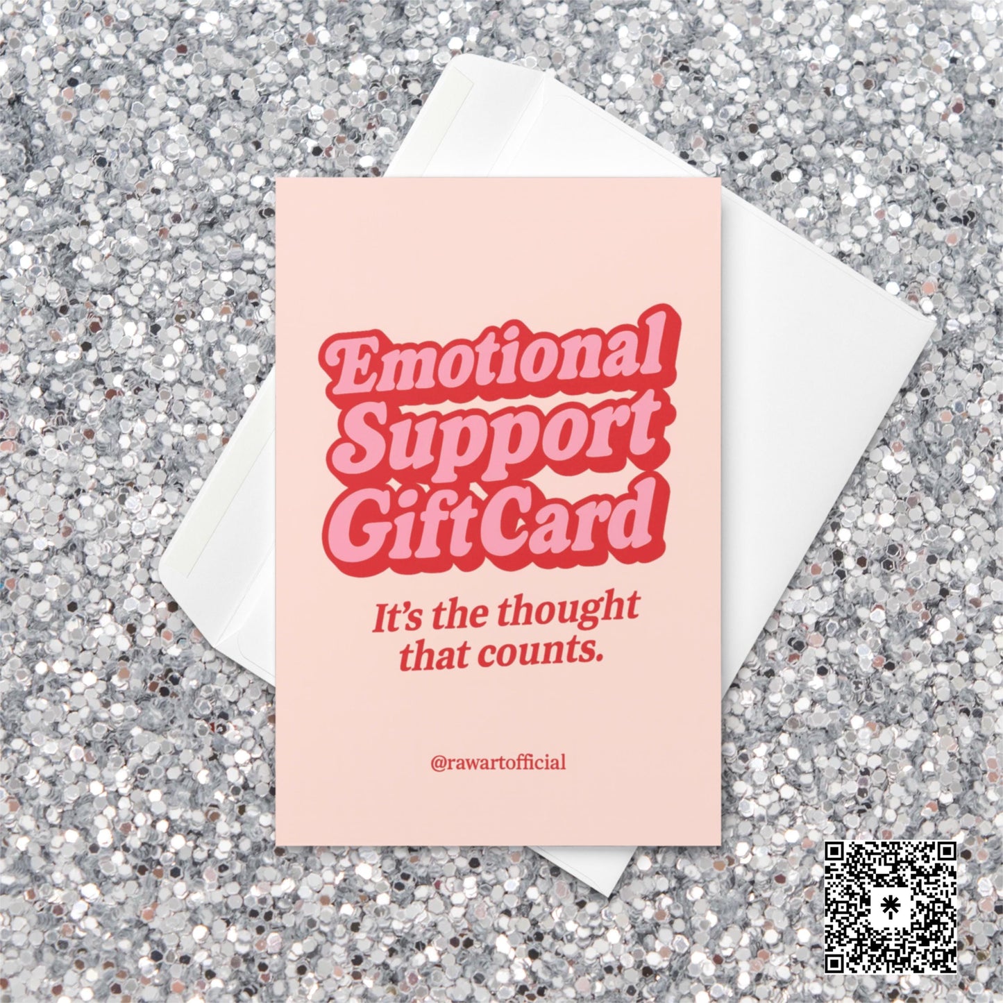 Pink and red Christmas card with bold retro text reading “Emotional Support Gift Card — It’s the thought that counts.”