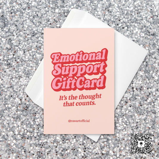 Pink and red Christmas card with bold retro text reading “Emotional Support Gift Card — It’s the thought that counts.”