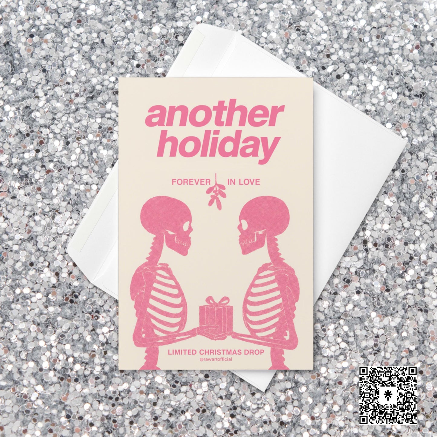 Minimalist pink Christmas card featuring two skeletons facing each other under mistletoe, holding a gift, with text reading “Another Holiday — Forever in Love.”
