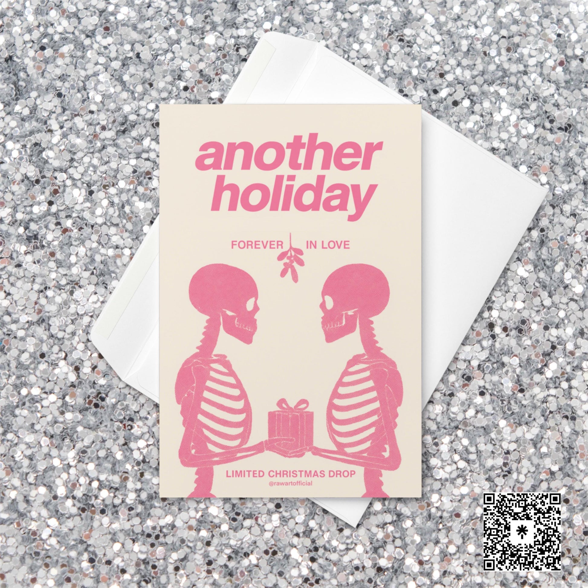 Minimalist pink Christmas card featuring two skeletons facing each other under mistletoe, holding a gift, with text reading “Another Holiday — Forever in Love.”