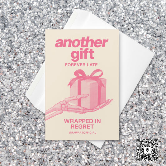 Minimalist pink Christmas card featuring a skeleton hand holding a wrapped present with text reading “Another Gift — Forever Late, Wrapped in Regret.”