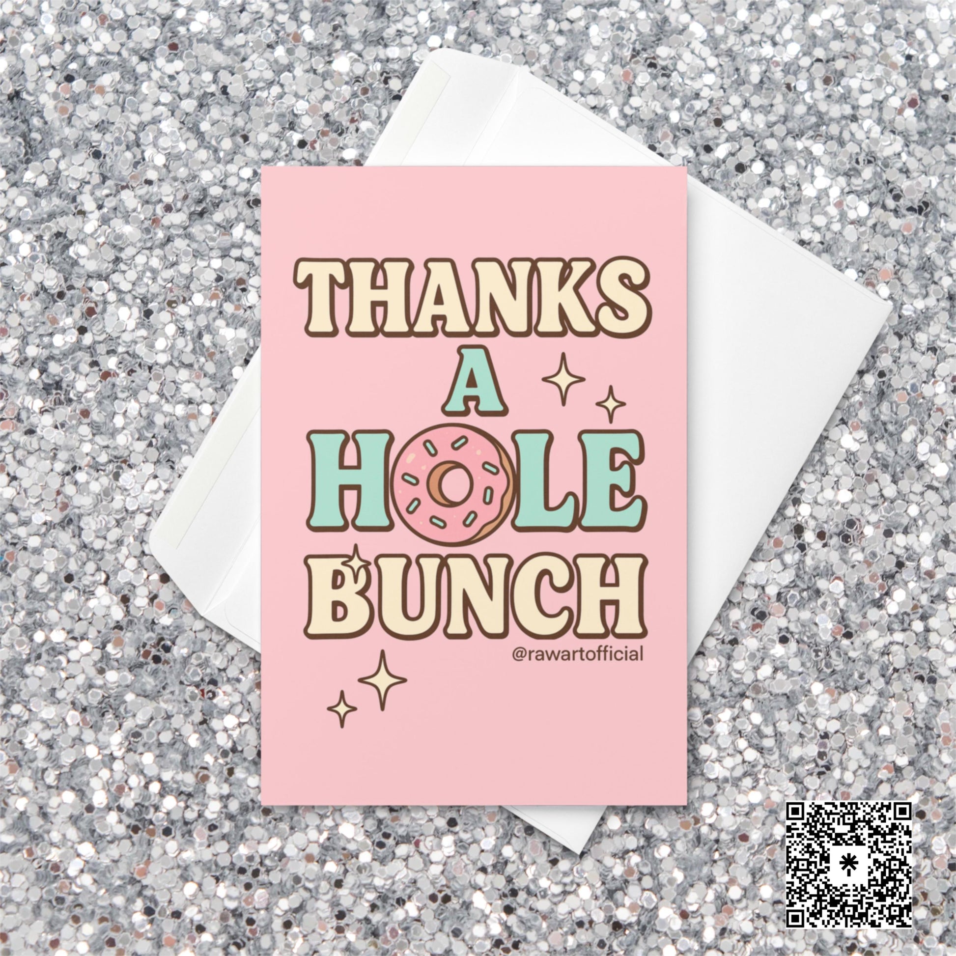 Pink and mint retro-style card with a sprinkled donut for the “O” in “Thanks a Hole Bunch,” surrounded by sparkles. Designed by @rawartofficial.