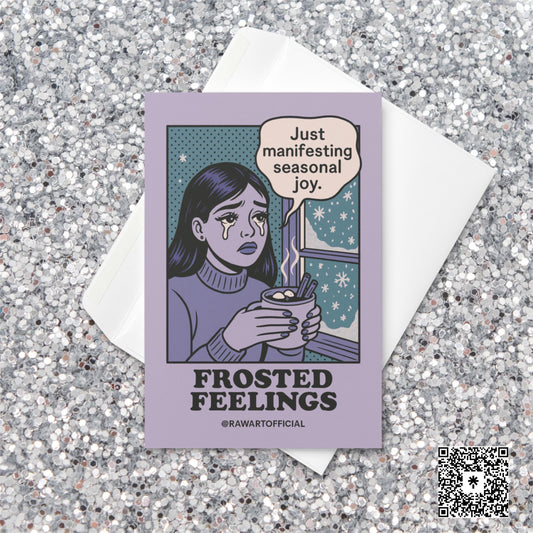 Illustrated woman with tears holding hot cocoa by a snowy window, text reads “Just manifesting seasonal joy,” caption “Frosted Feelings” by @rawartofficial.