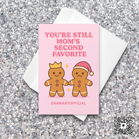 Gingerbread siblings Christmas card with pink background and funny “mom’s second favorite” text.