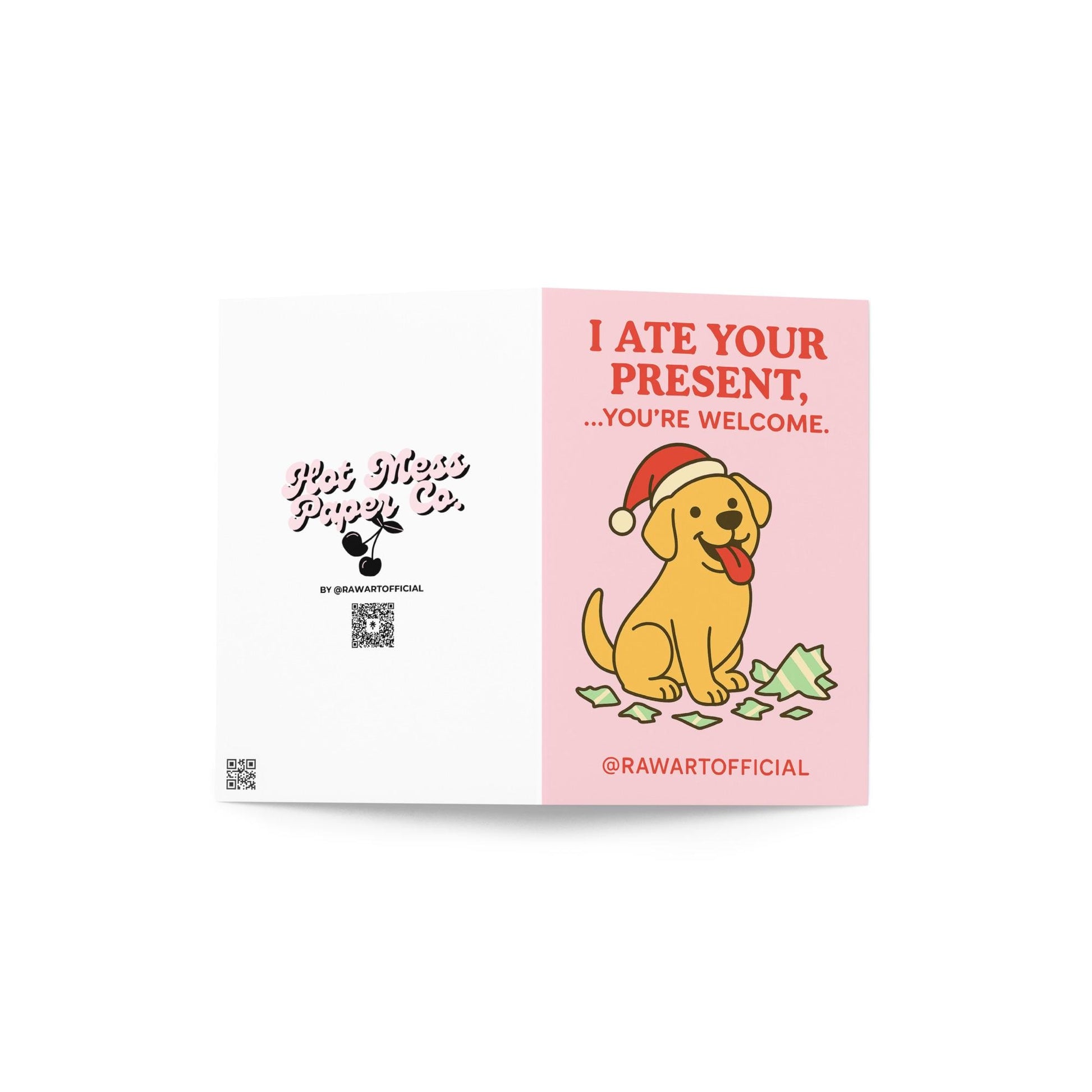Cute yellow Lab Christmas card sitting with torn wrapping paper on pink background.