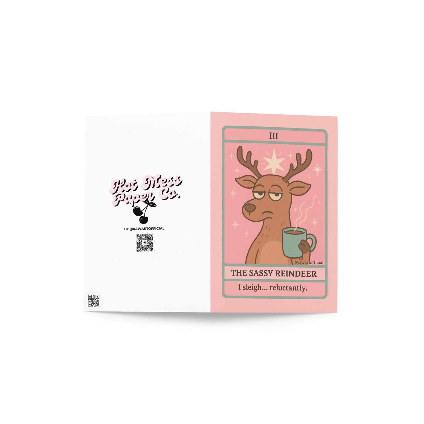 Sassy reindeer Christmas tarot card holding a mug on pink background.