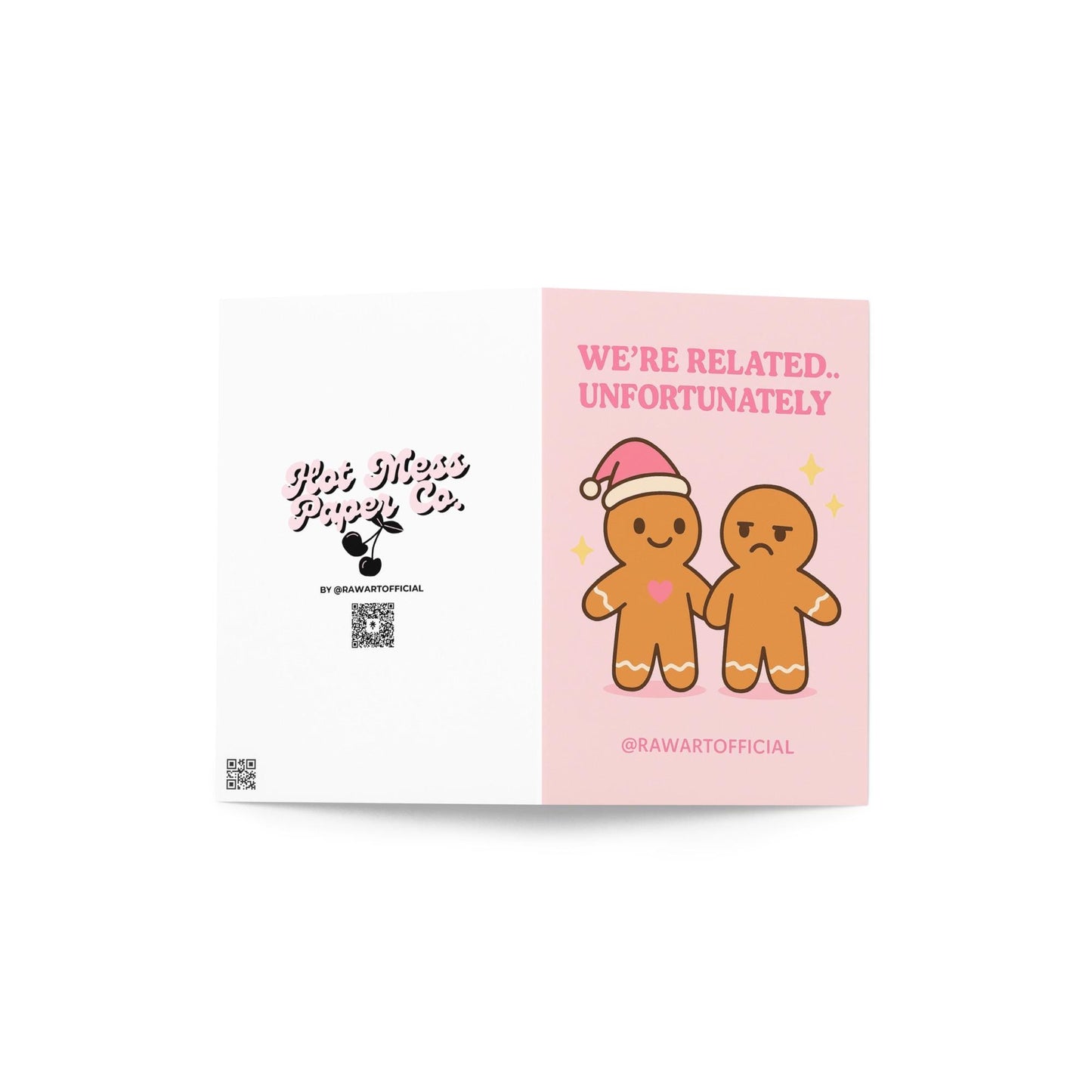 Pink gingerbread sibling Christmas card with one smiling and one annoyed.