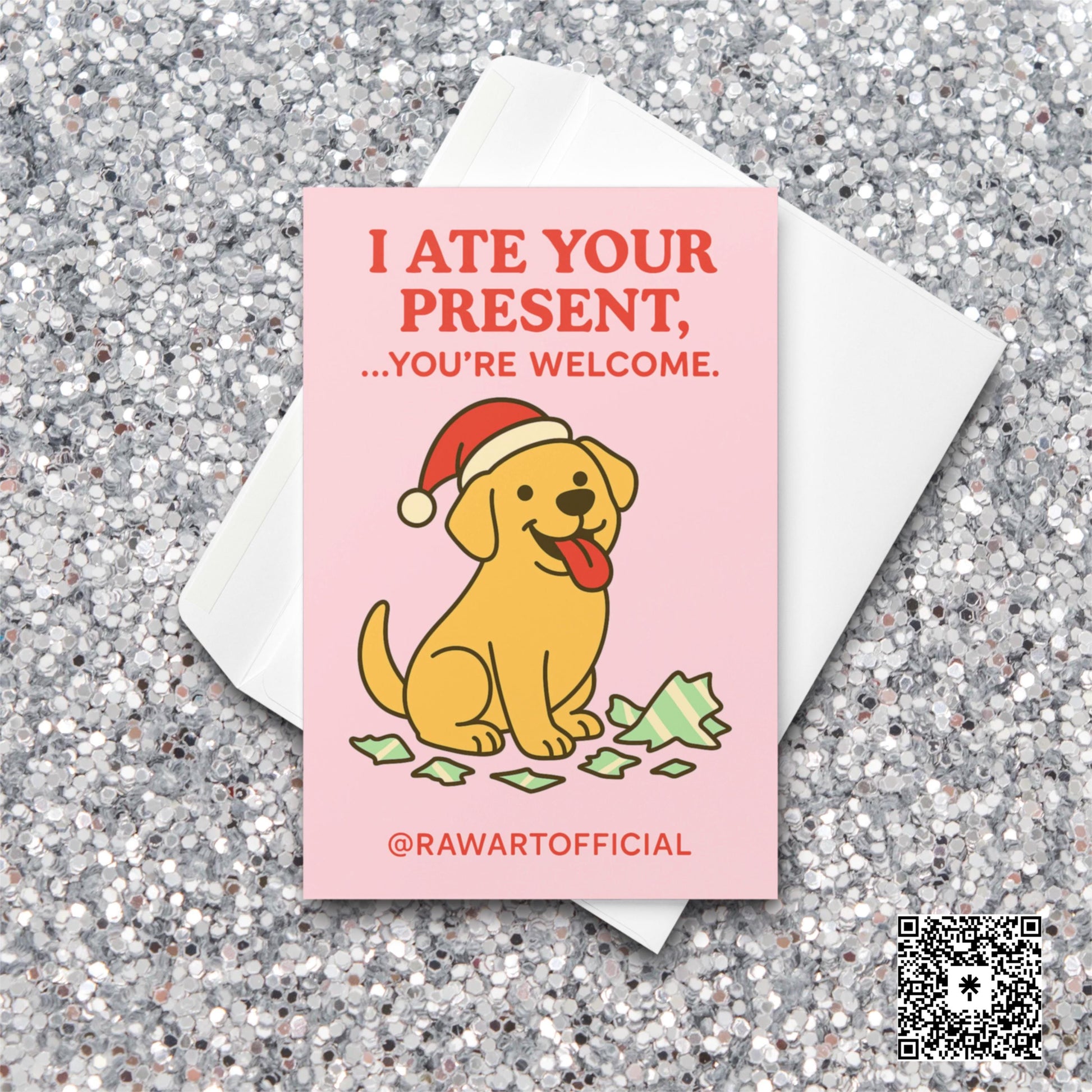 Cute yellow Lab Christmas card sitting with torn wrapping paper on pink background.