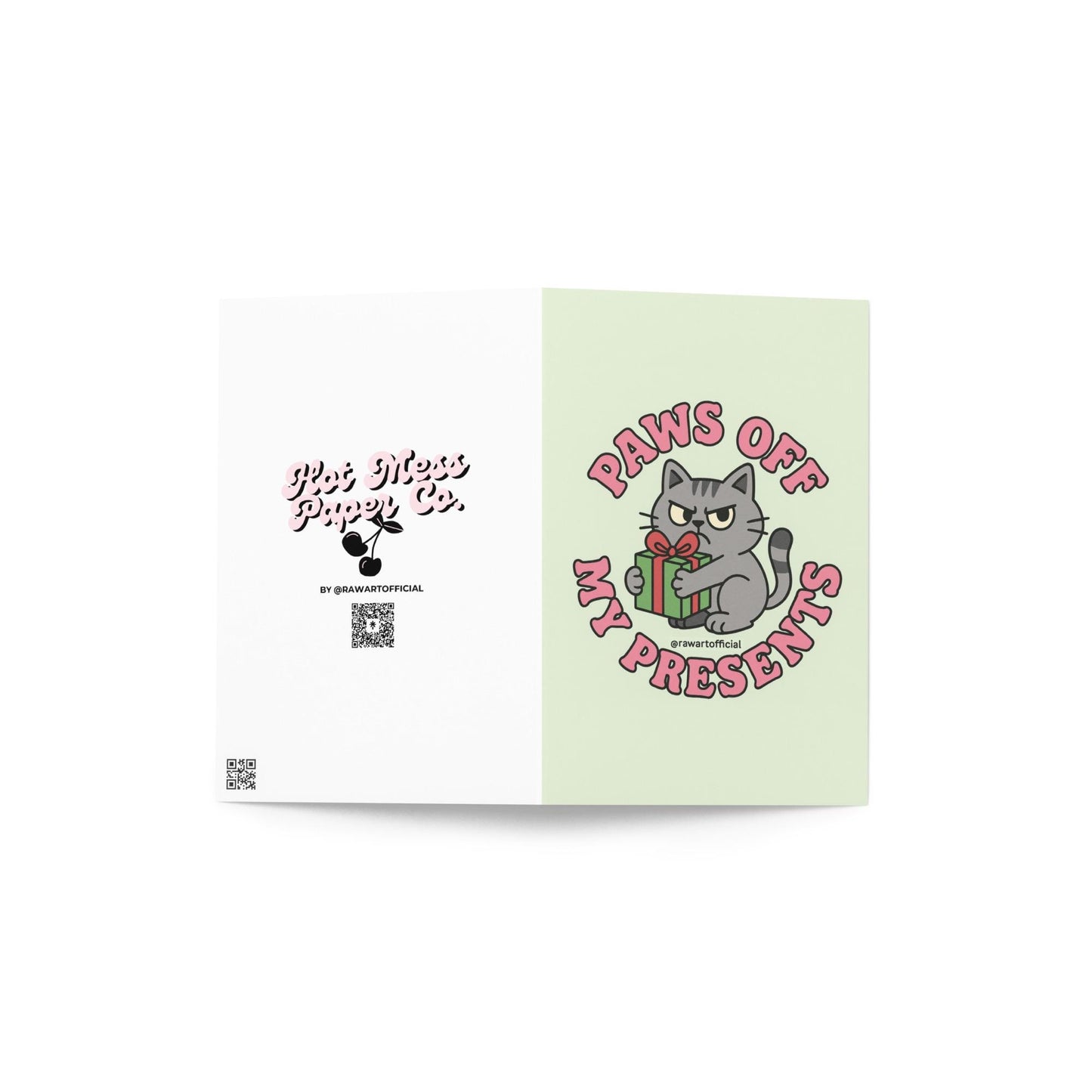 Orange cat in Santa hat ripping wrapping paper with text “Naughty By Nature.”