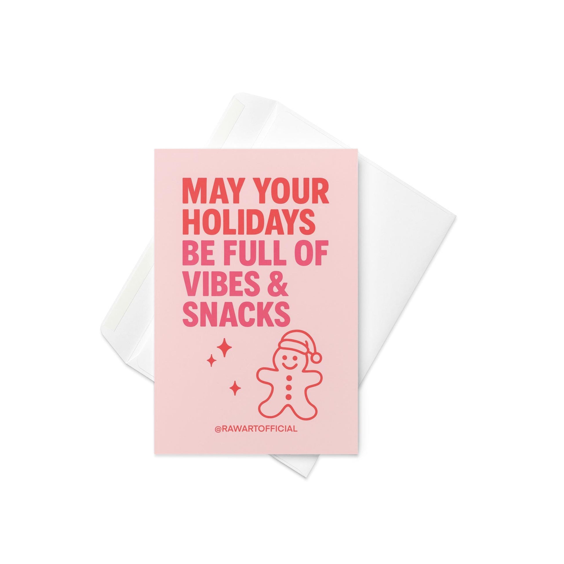 Pink Christmas card with bold text “May Your Holidays Be Full of Vibes & Snacks” and gingerbread doodle.