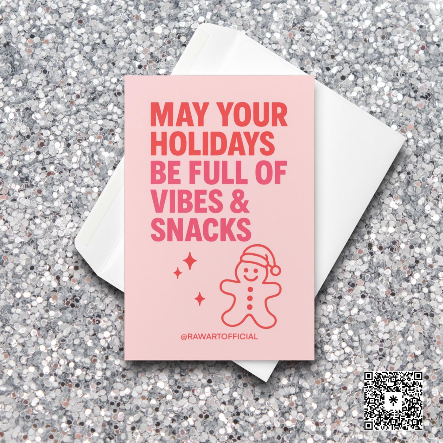 Pink Christmas card with bold text “May Your Holidays Be Full of Vibes & Snacks” and gingerbread doodle.