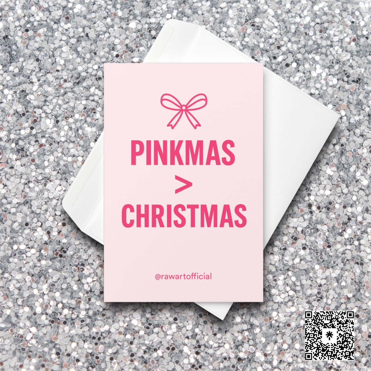 Pink card with bow icon and text “Pinkmas > Christmas” in bold hot-pink lettering.