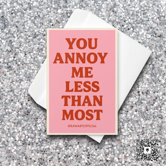 Pink card with bold red text reading “You Annoy Me Less Than Most.”