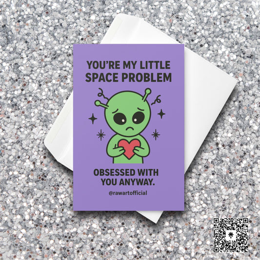 Cute sad green alien holding a red heart with text “You’re My Little Space Problem.”