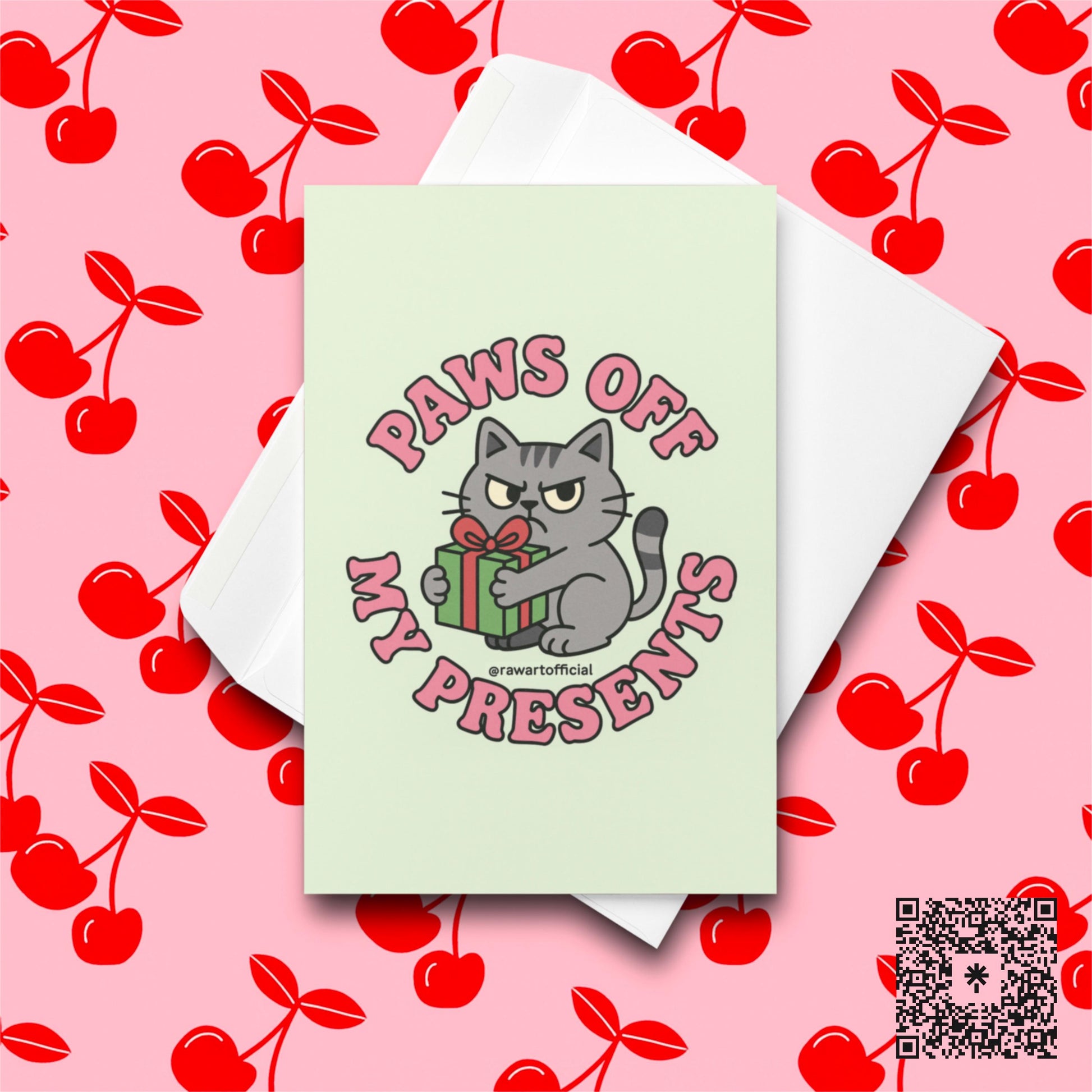 Orange cat in Santa hat ripping wrapping paper with text “Naughty By Nature.”