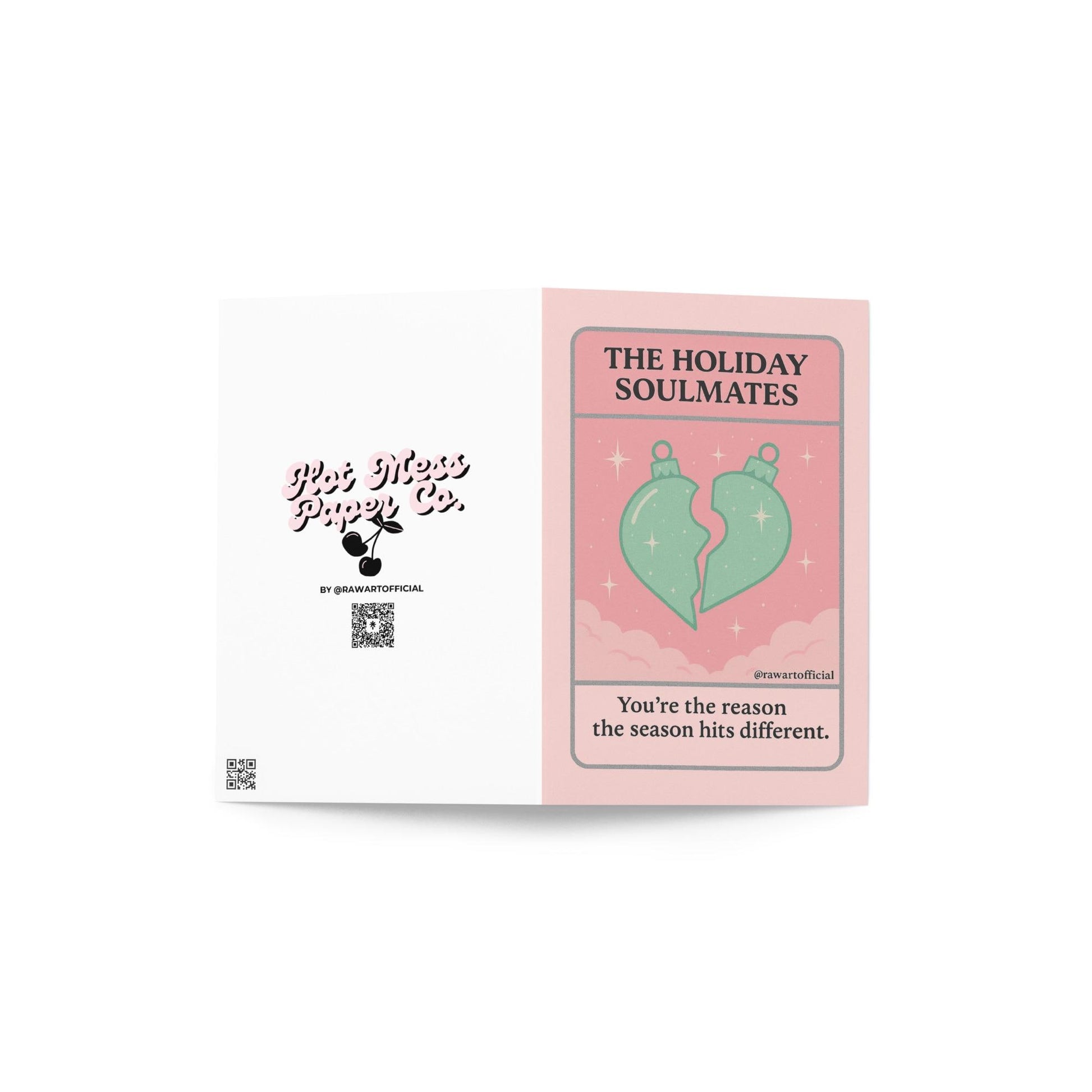 Pink tarot-style card with two ornament halves forming a heart and text “The Holiday Soulmates.”