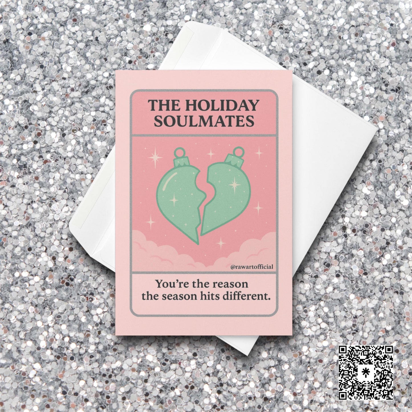 Pink tarot-style card with two ornament halves forming a heart and text “The Holiday Soulmates.”