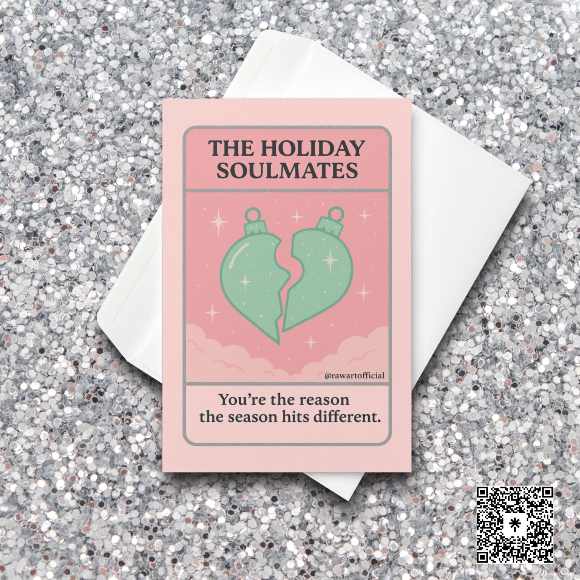 Pink tarot-style card with two ornament halves forming a heart and text “The Holiday Soulmates.”