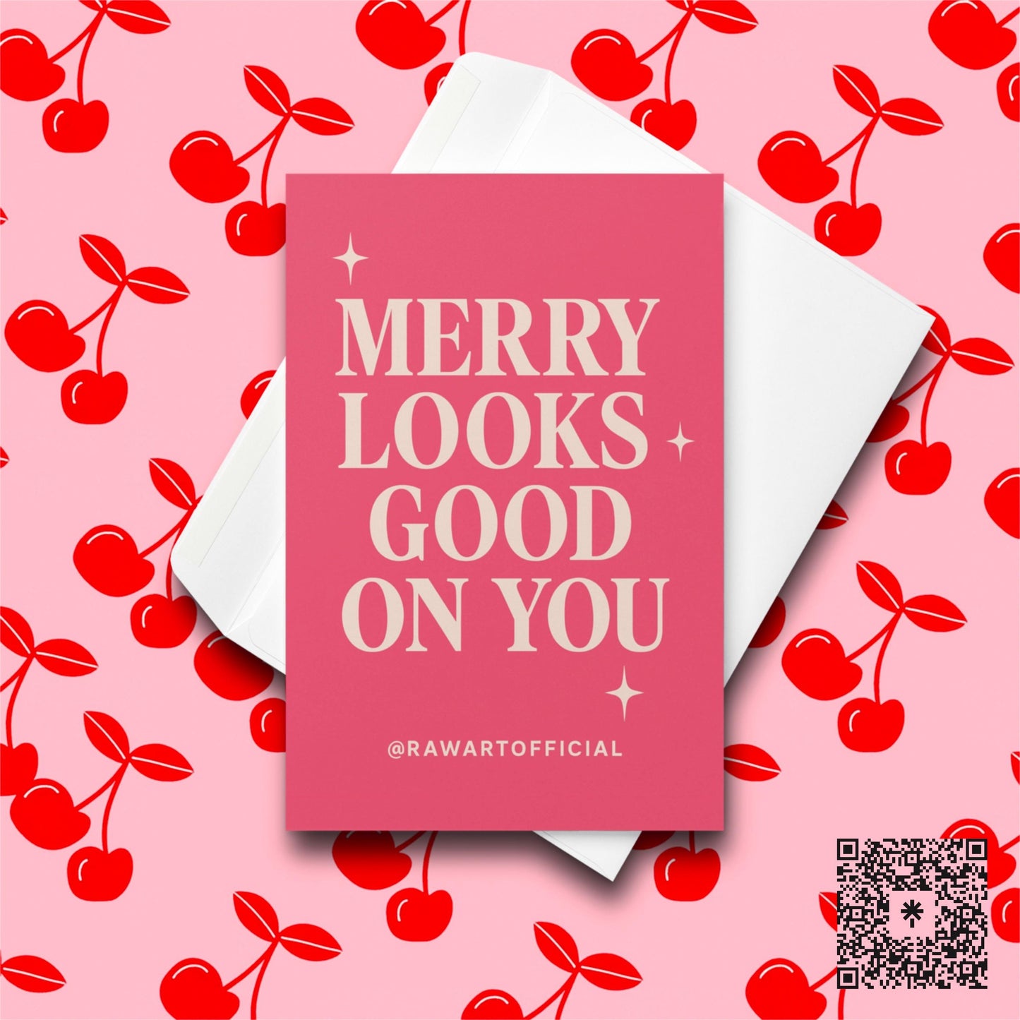 Pink card with retro cream text reading “Merry Looks Good on You” with sparkly accents.