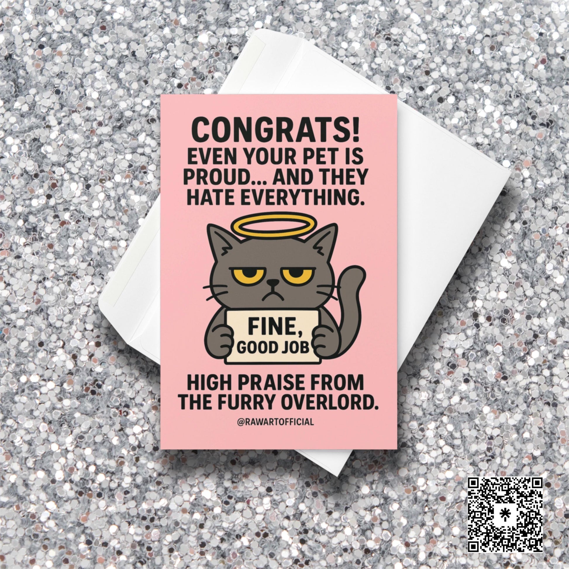 Pink congratulations card with a grumpy grey cat holding a sign that says “FINE, GOOD JOB” and a sarcastic message above.