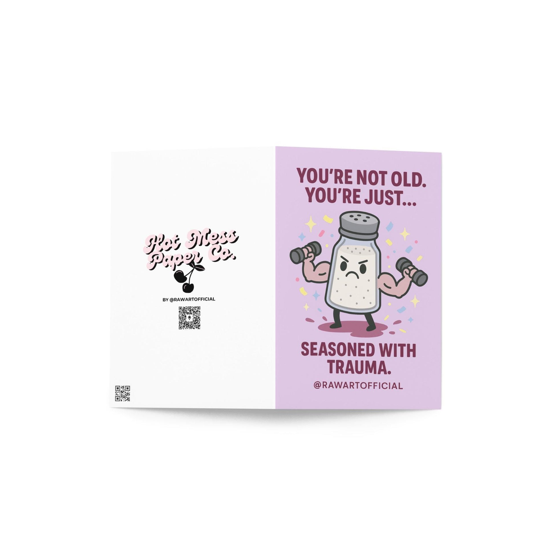 Buff salt shaker lifting weights with confetti and text: “You’re not old, just seasoned with trauma.”