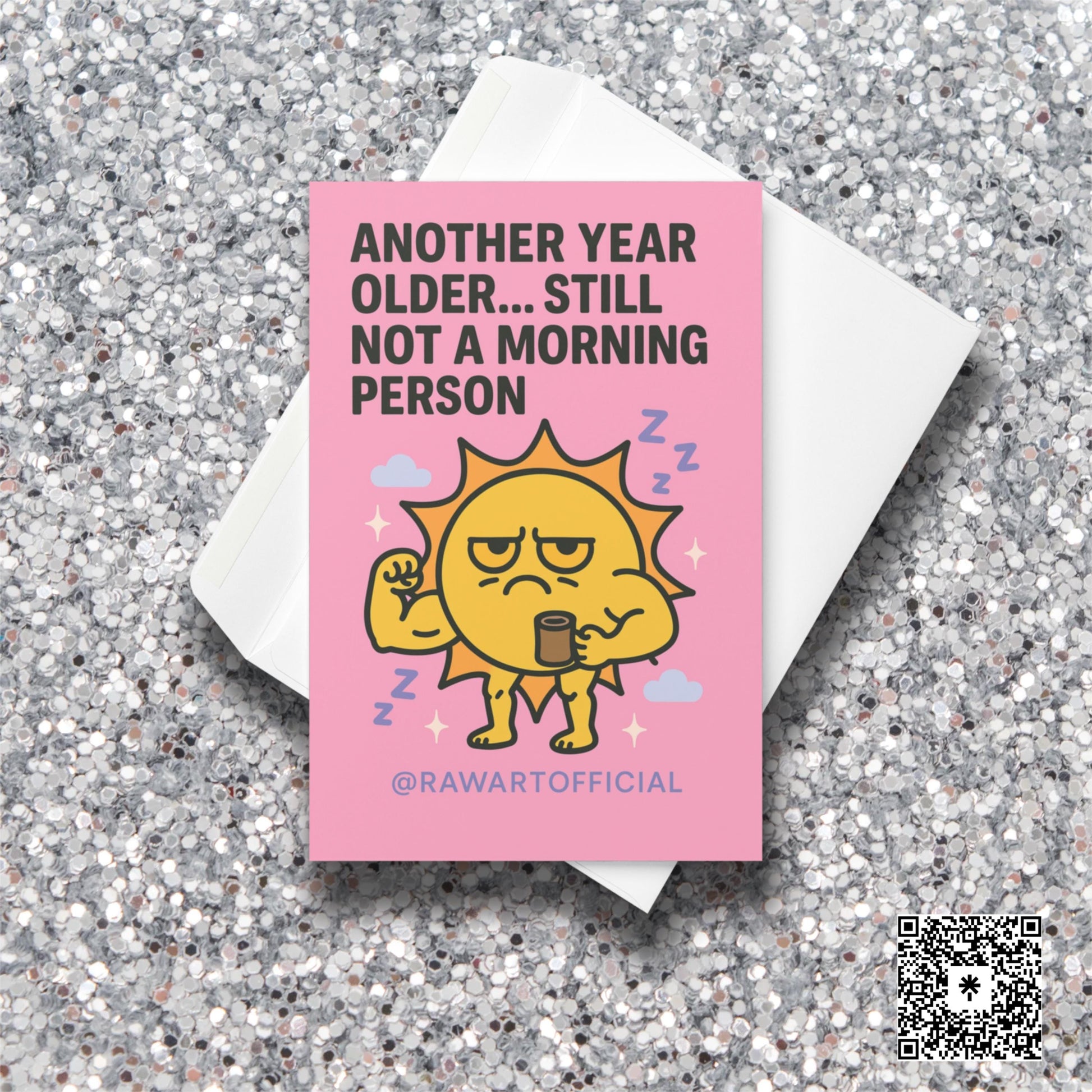 Grumpy muscular sun holding coffee, surrounded by clouds and sparkles on a pink birthday card.