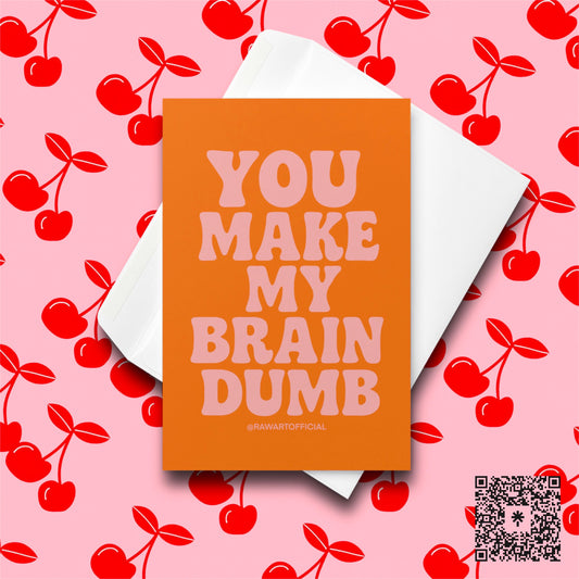Pink retro Valentine card with text “You Make My Brain Dumb.”