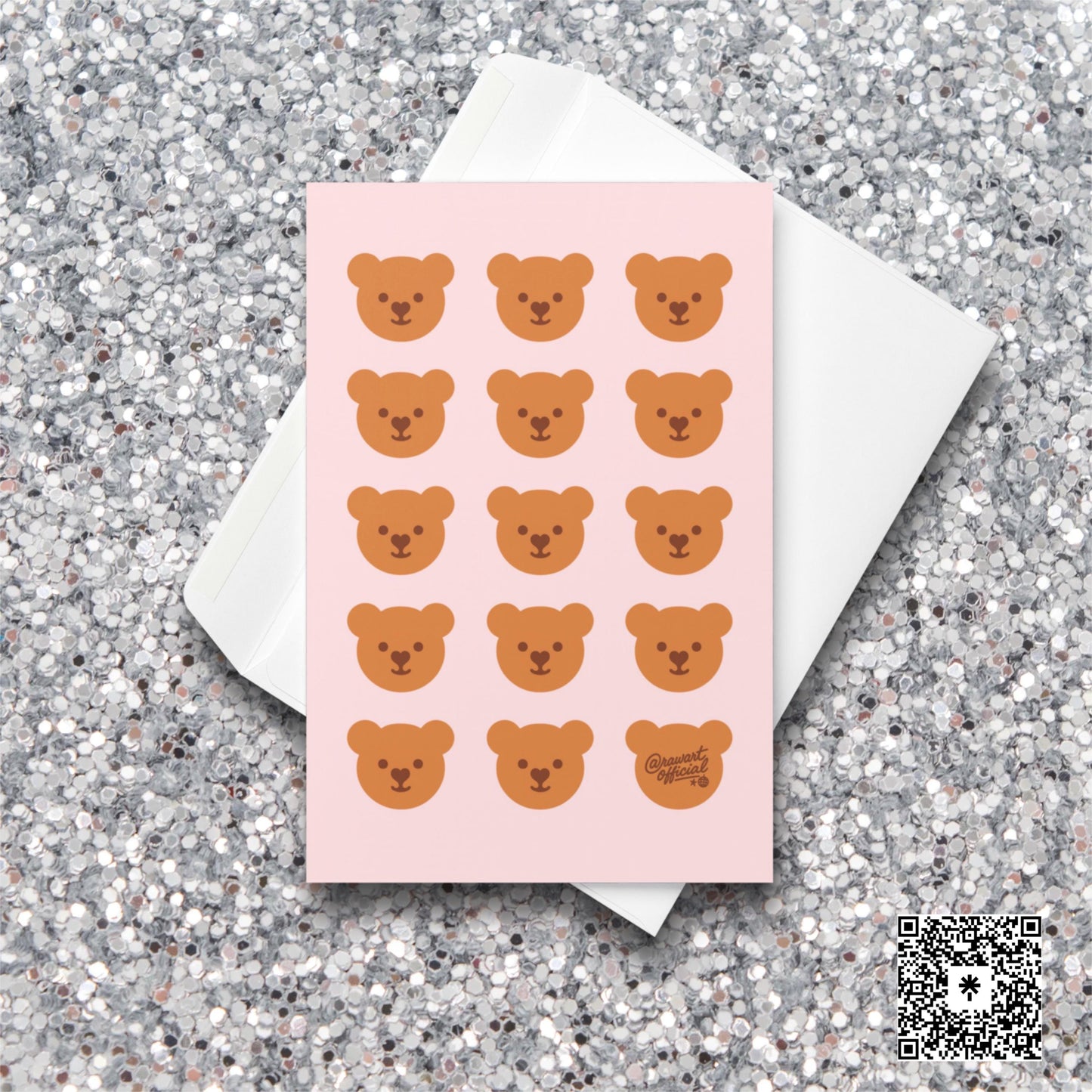 Pink card with repeating kawaii teddy bear faces in rows, one signed @rawartofficial.