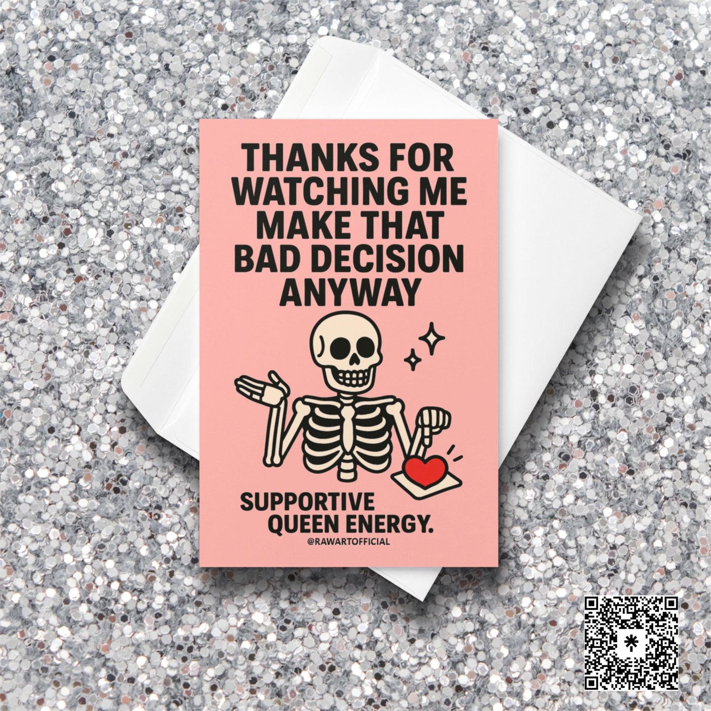 Pink card with cute cartoon skeleton shrugging while holding a heart tray and text saying “Thanks for watching me make that bad decision anyway.”