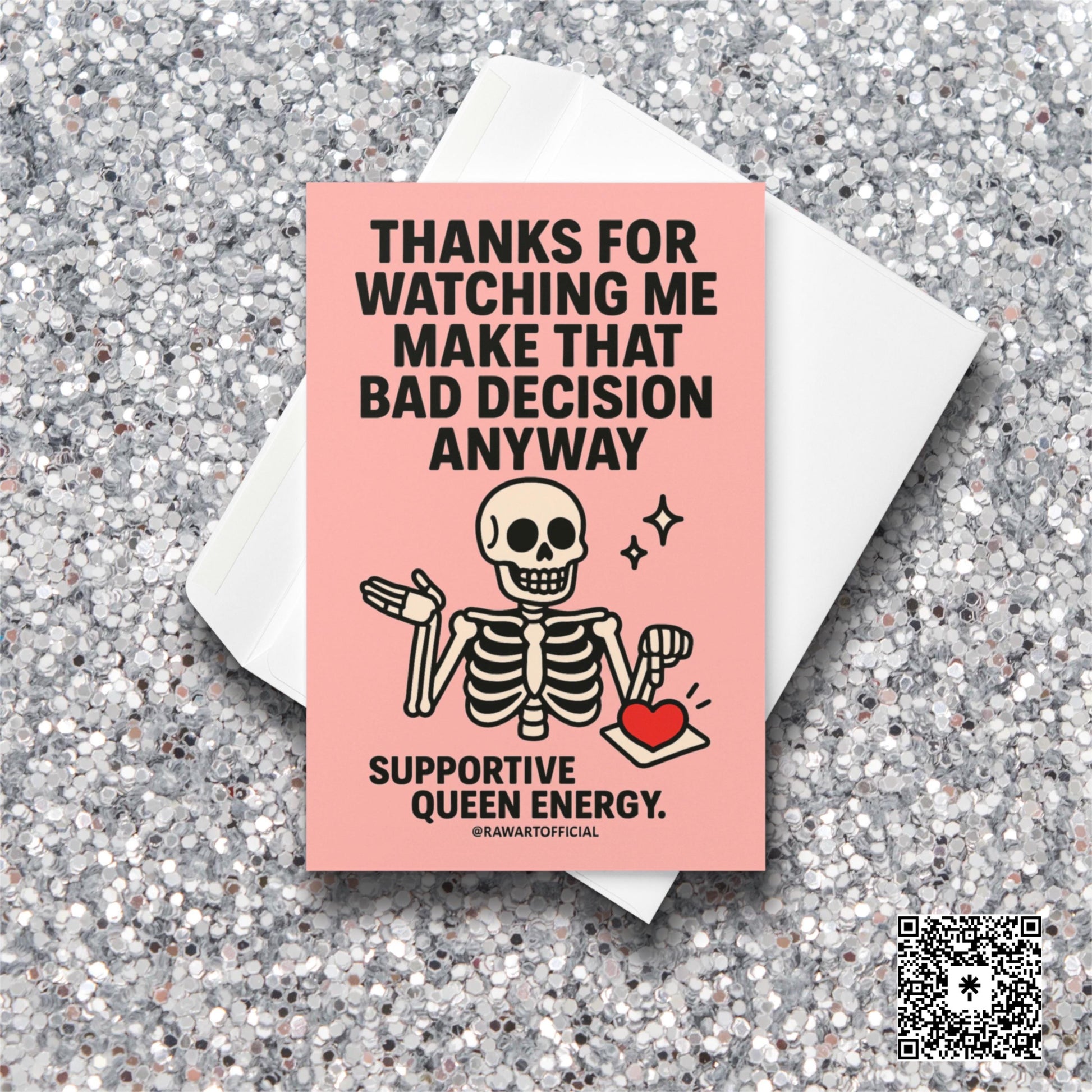 Pink card with cute cartoon skeleton shrugging while holding a heart tray and text saying “Thanks for watching me make that bad decision anyway.”