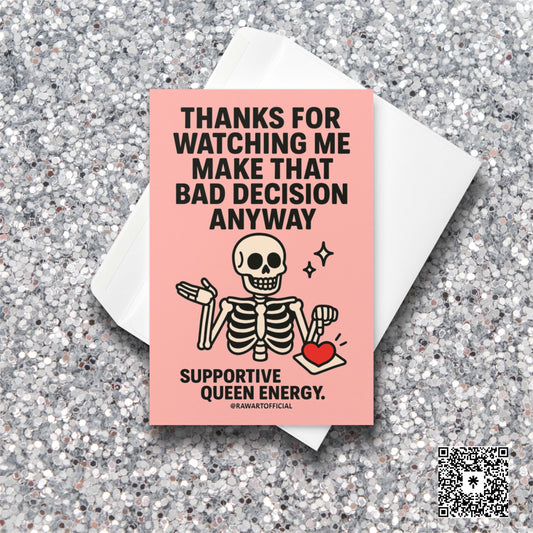 Pink card with cute cartoon skeleton shrugging while holding a heart tray and text saying “Thanks for watching me make that bad decision anyway.”