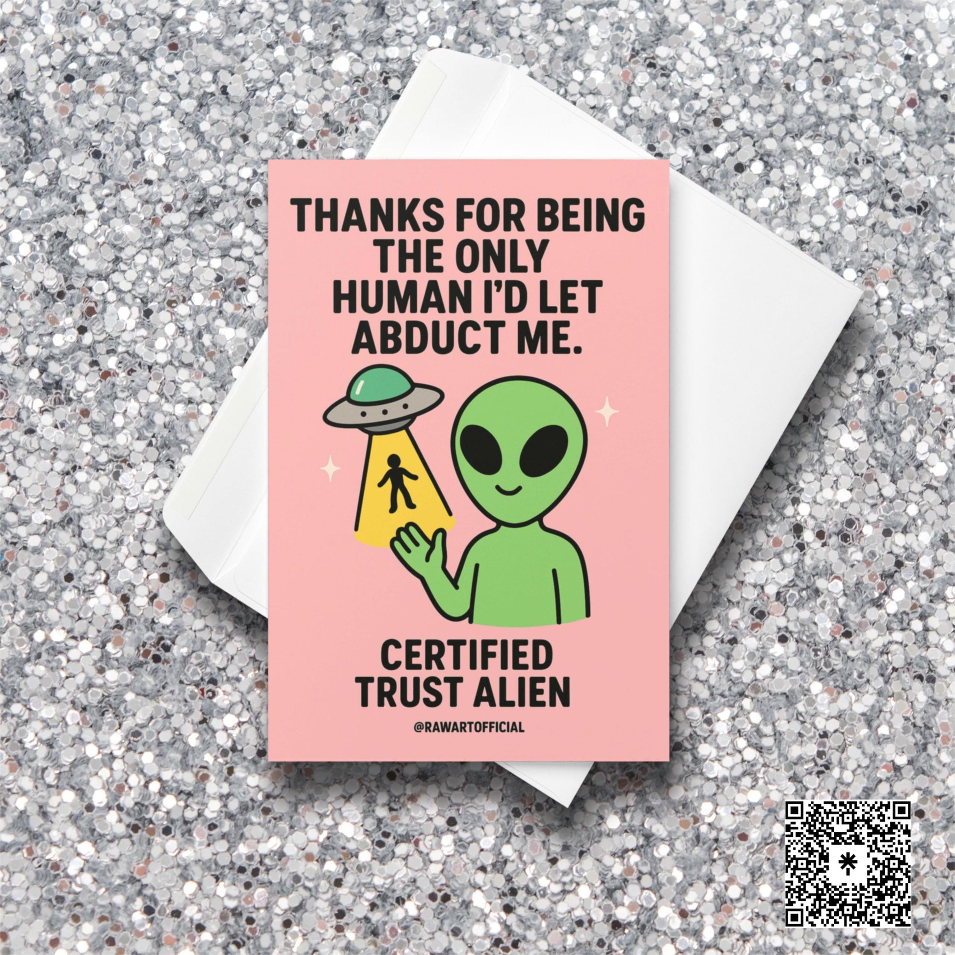 Green alien holding a UFO beam with a tiny human inside, text saying “Thanks for being the only human I’d let abduct me.”