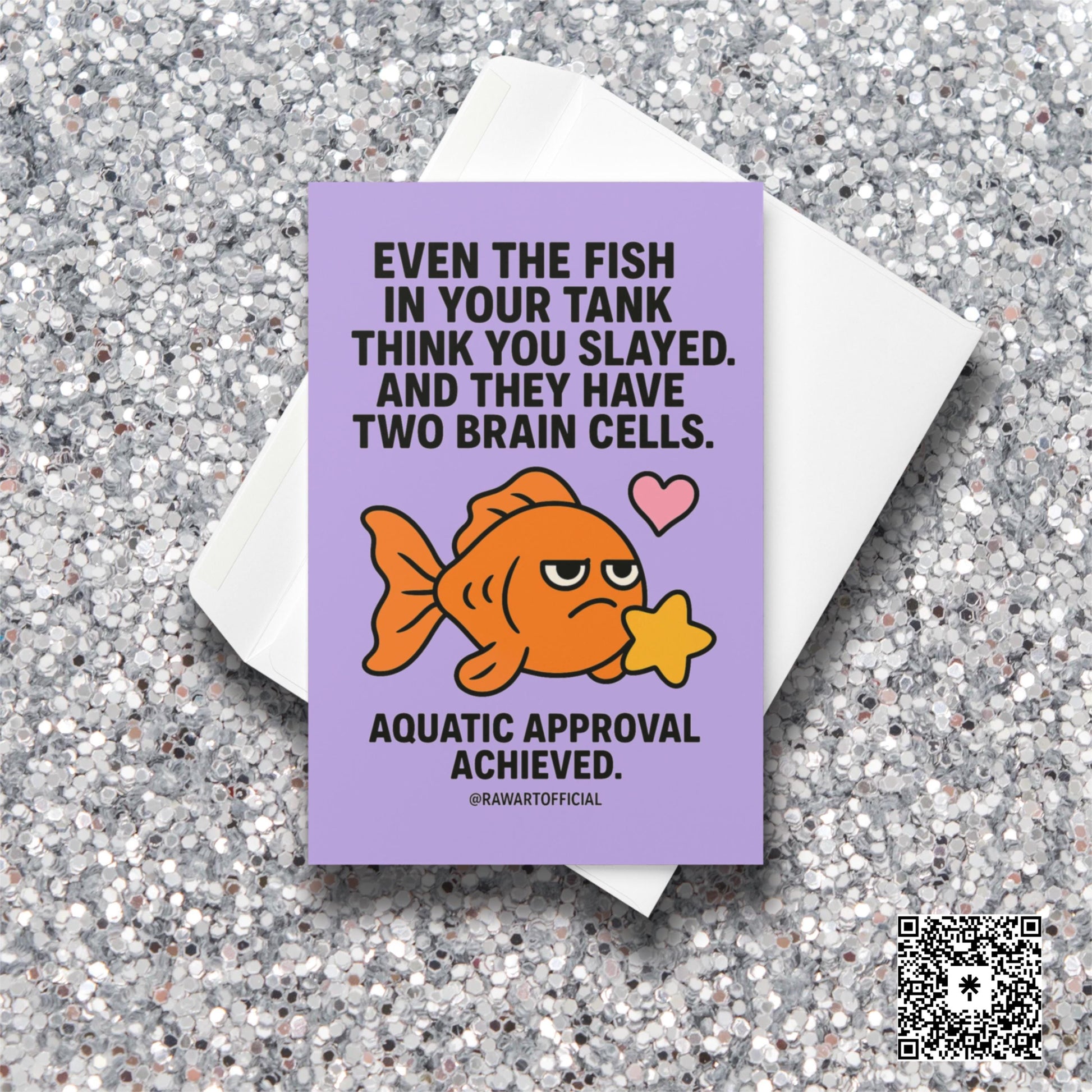 Cute orange goldfish holding a yellow star with text saying “Even the fish in your tank think you slayed… Aquatic approval achieved.” Lilac background.
