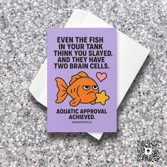 Cute orange goldfish holding a yellow star with text saying “Even the fish in your tank think you slayed… Aquatic approval achieved.” Lilac background.