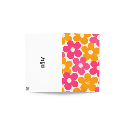 mother’s day greeting card with oversized pink and orange retro flowers on cream background