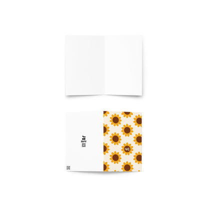 Mother’s Day greeting card featuring a bold retro sunflower pattern with mustard yellow petals and brown centers on a cream background, signed @rawartofficial.